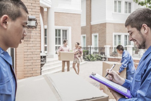 Professional home moving team planning a South Kensington relocation