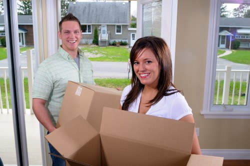 Moving team loading items safely into a van