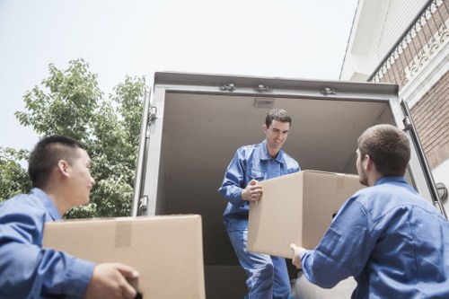 Packed boxes and furniture ready for a flat move in South Kensington