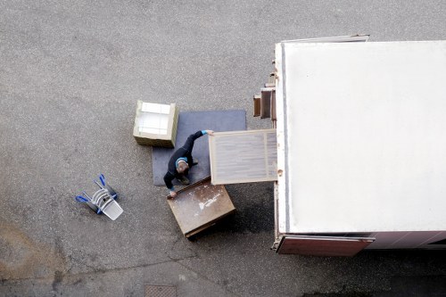 Packing and preparing boxes for a moving truck in South Kensington