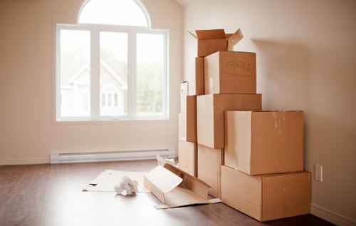 Movers handling furniture carefully during a Southkensington home relocation