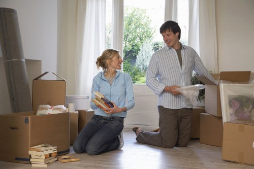 Packing supplies and labeled boxes prepared for house removals in Southkensington