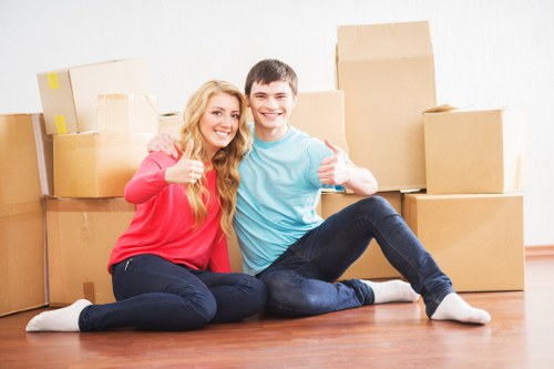 Transport team handling furniture safely during move
