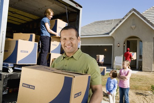 Careful unloading of household belongings at a new Southkensington home