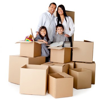 Moving team preparing furniture for transport with a removal van